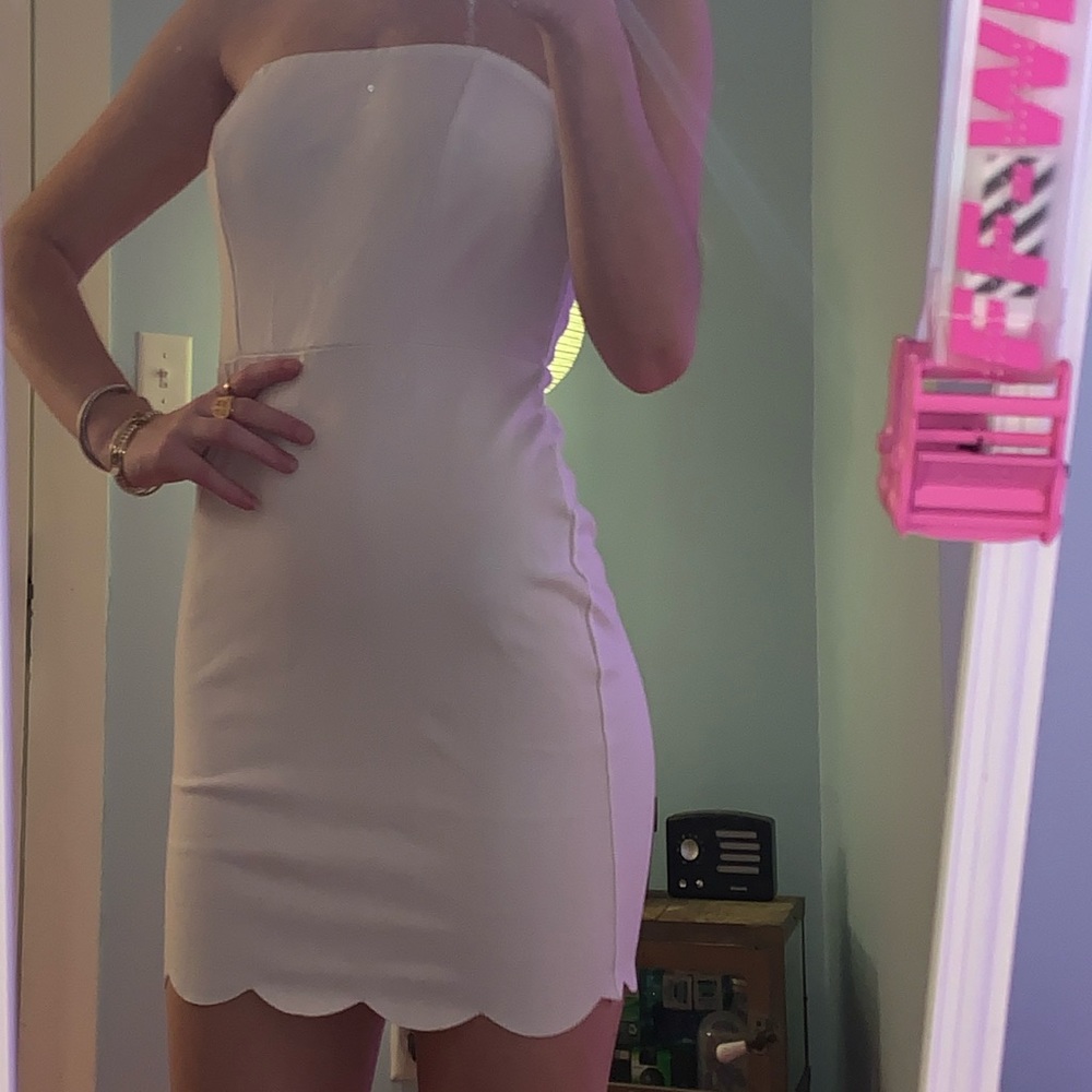 White body con dress with scalloped edges